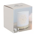 White ceramic diffuser with wooden base in a clear box packaging on a white background